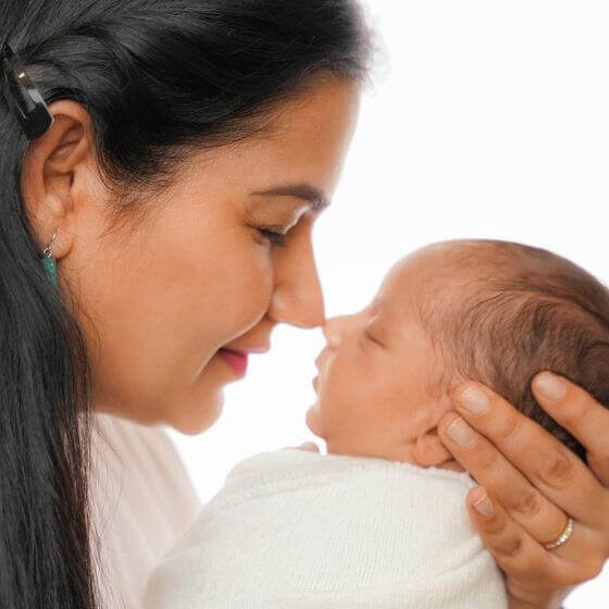 Mother holding her baby