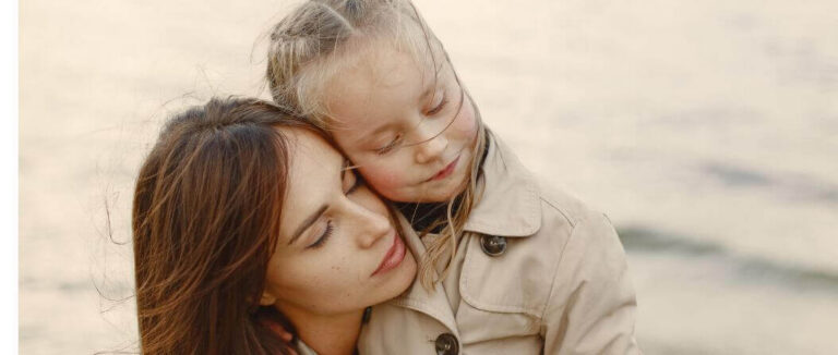 Mother and child by the sea